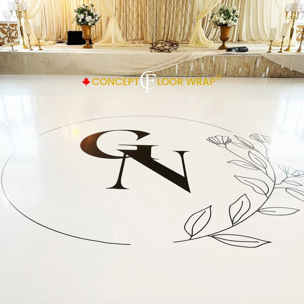 White floorwrap with black initials